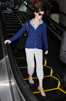 Emma Watson on the escalator
