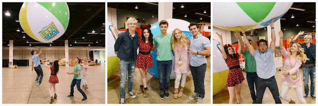 The cast of Teen Beach Movie have some fun with a giant beach ball at the 2013 Disney D23 Expo 