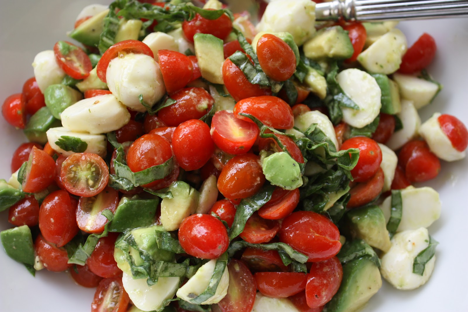 marinated mozzarella cherry tomato and basil salad.