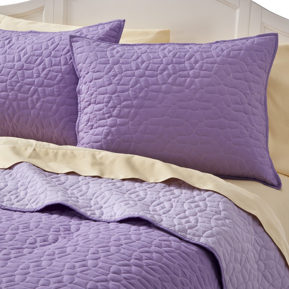 Learning. Living. Giving. bunk beds, quilts and designer pillows