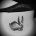 Cute rabbit tattoo on side body
