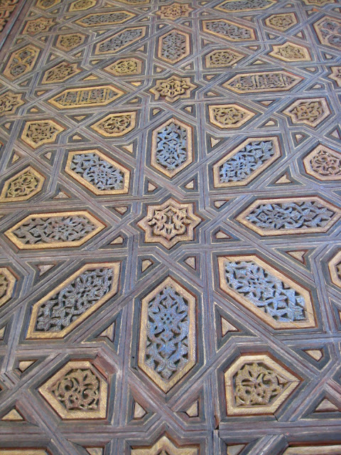 Wooden door in The Alcazar, or Royal Palace in Seville, Spain. Wooden door in The Alcazar, or Royal Palace in Seville, Spain.