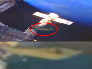 Are we being invaded by an Extraterrestrial armada? Swarm of mysterious objects passing by the ISS Ufo+docked+ISS+NASA
