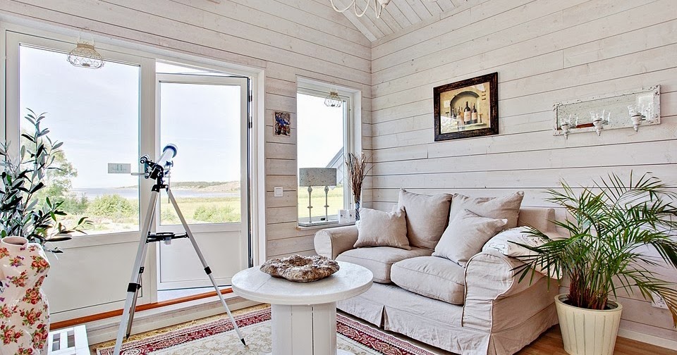 Decoración Fácil: UNA CASA EN MADERA CLARA QUE ENAMORA