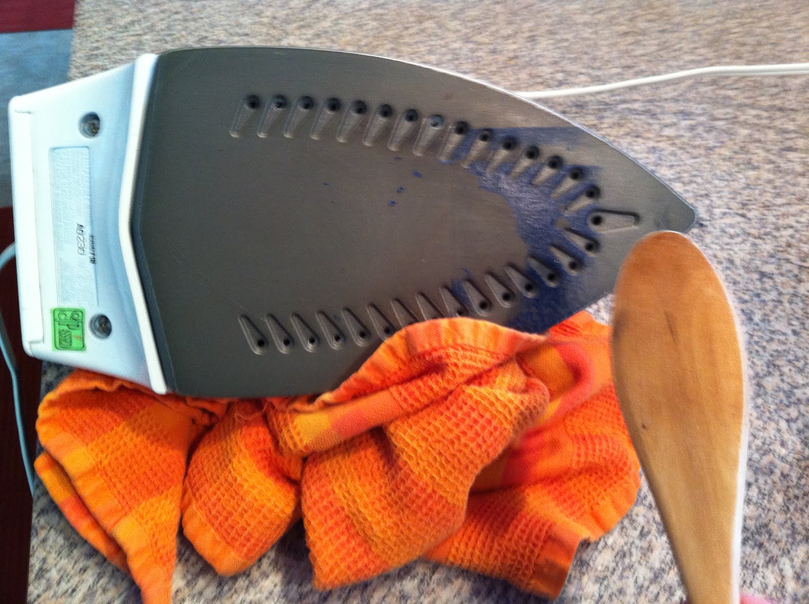 everywhere orange Fabric stuck on my iron