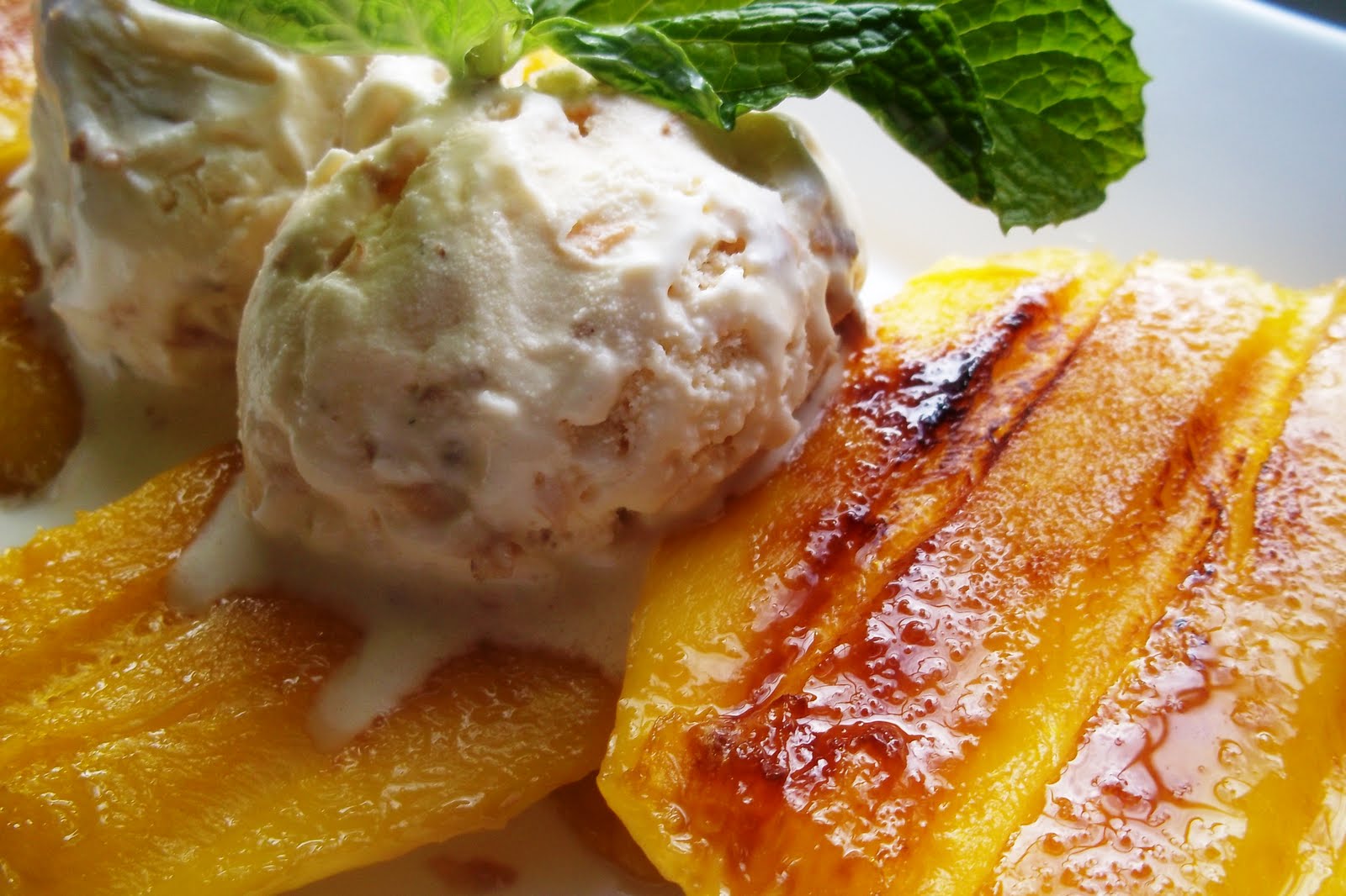 Sinful Sundays grilled mangoes w/ coconut icecream