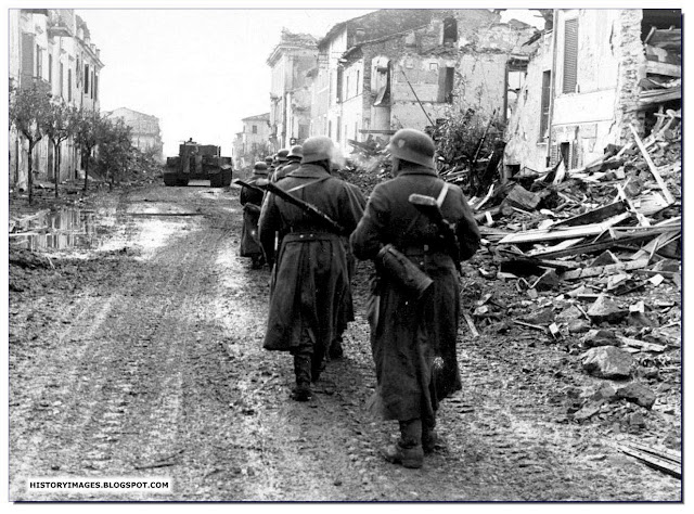 German soldiers  Italian town with  Tiger tank  1944