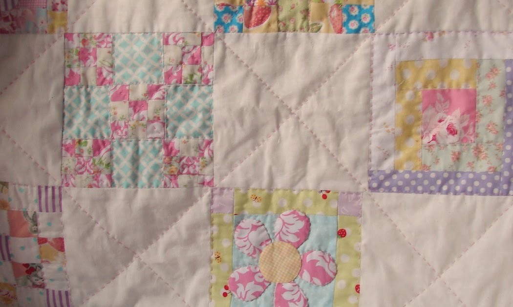 Roxy Creations Cot quilt patchwork with flower applique