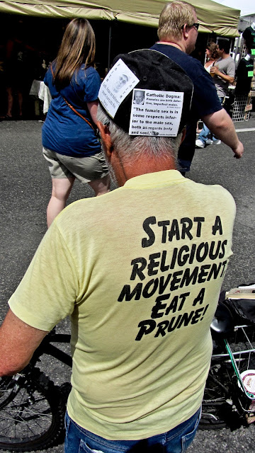 An anti-religion, funny t-shirt that says 'Start A Religious Movement Eat A Prune'.
