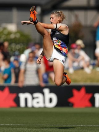 decisive moment: "Aussie-rule" female player