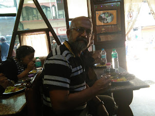 Relishing the "Pork Thali" in Trattoria restaurant in Shillong.