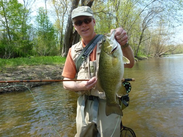 Color photo with steelhead fishing river