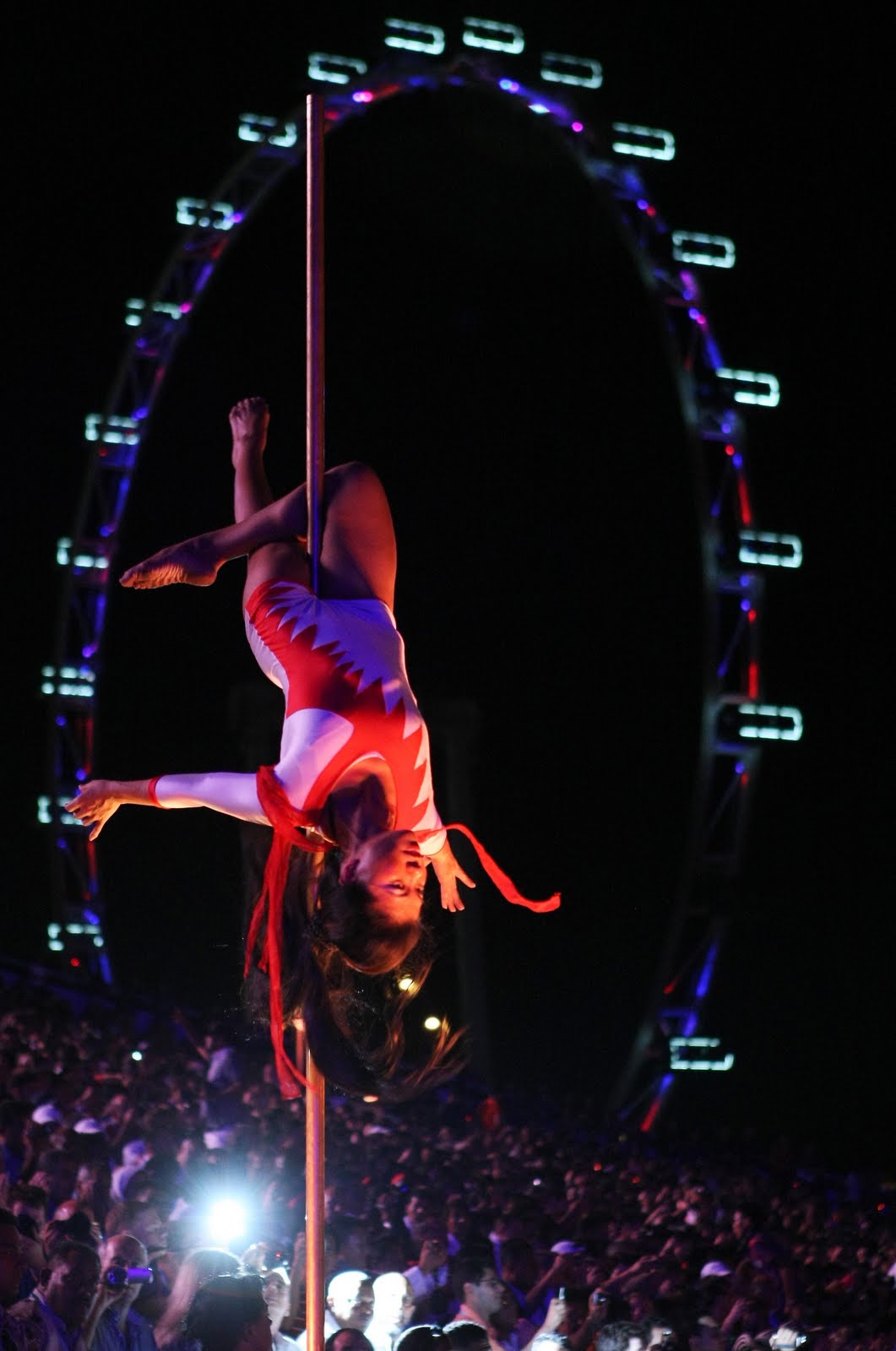 S M Ong Pole dancing at the National Day Parade? Take it off!