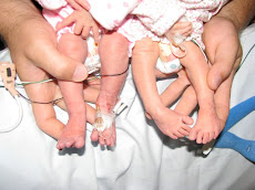 Can you tell which are our babies legs and which are Eric's fingers?