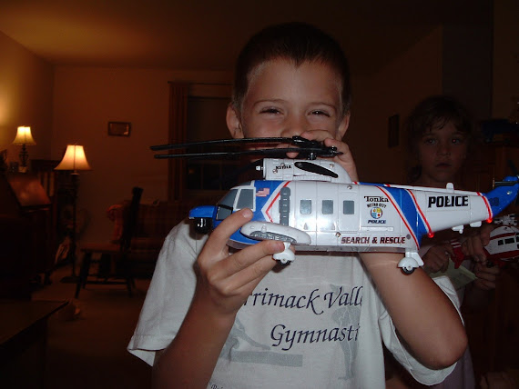Loving His Birthday Helicopter from Grandma Z.