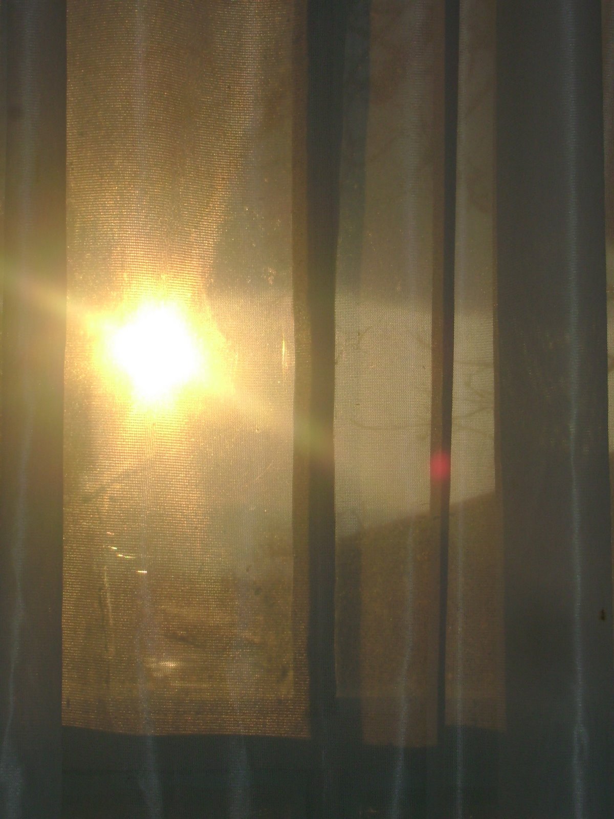 [3:26+sun+curtain.JPG]