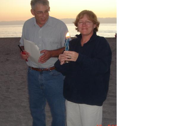 Bruce and Laura with the Havdalah Candle