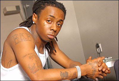 Lil Wayne Hit With Felonies