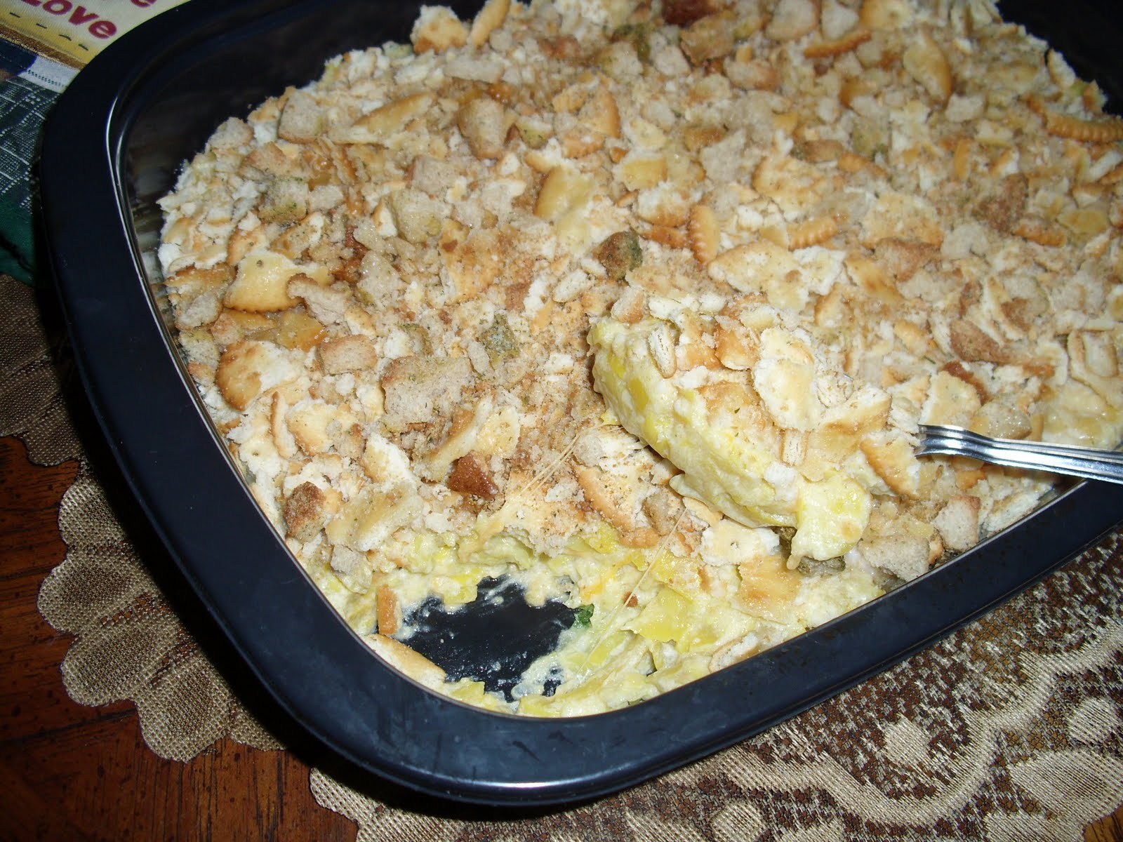 Just Put It In a Crockpot Cheesy Squash Casserole
