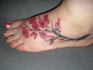 Female Japanese Tattoos With Images Japanese Cherry Blossom Tattoo Designs Especially Female Foot Japanese Cherry Blossom Tattoos Gallery Picture 6 Japanese Tattoos, Female Tattoos, Foot Tattoos, Cherry Blossom Tattoos, Japanese Cherry Blossom Tattoo