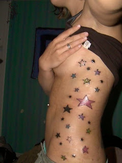 Women+tattoos+on+side