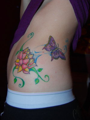 Womens+tattoos+on+sides+of+body