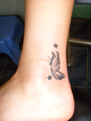 Star Tattoo For Girls On Foot. Stars Tattoos Designs On Foot.