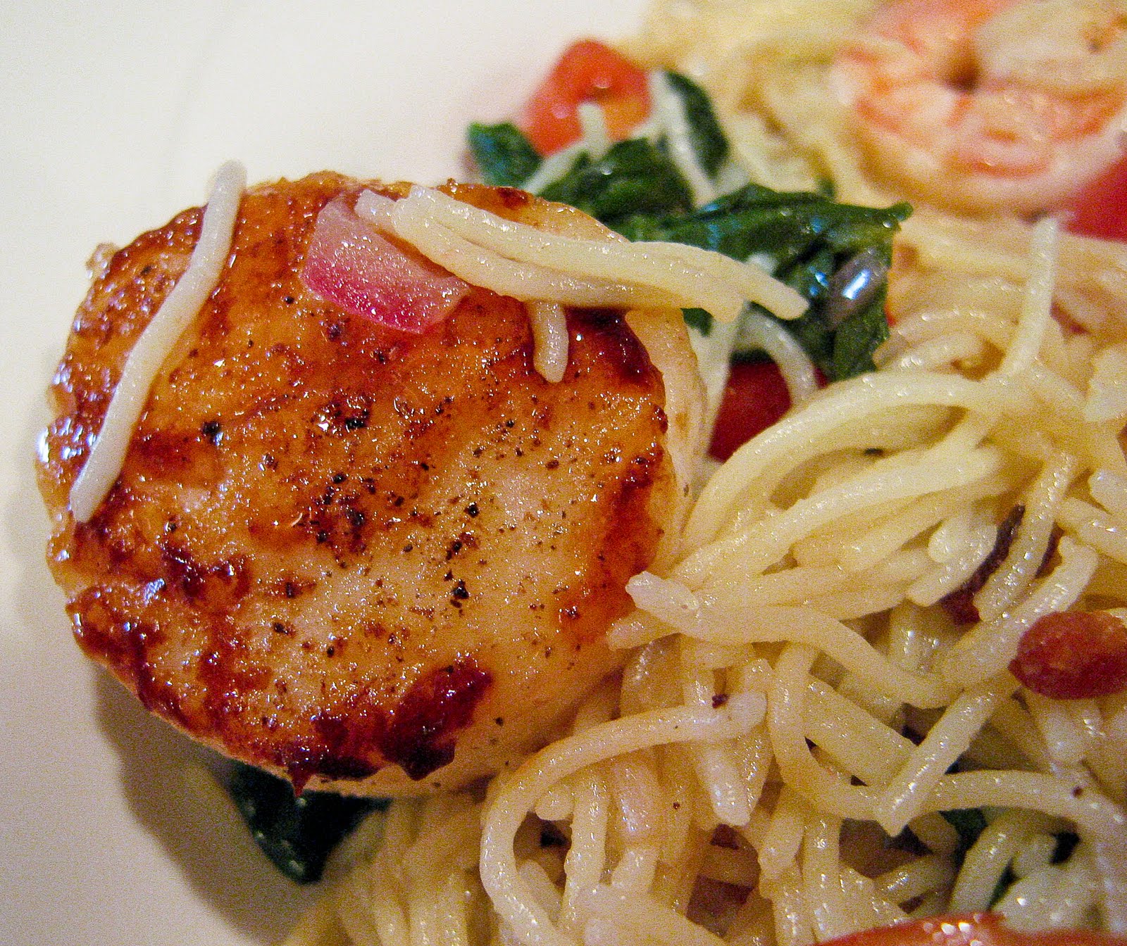 scallops and spinach over pasta