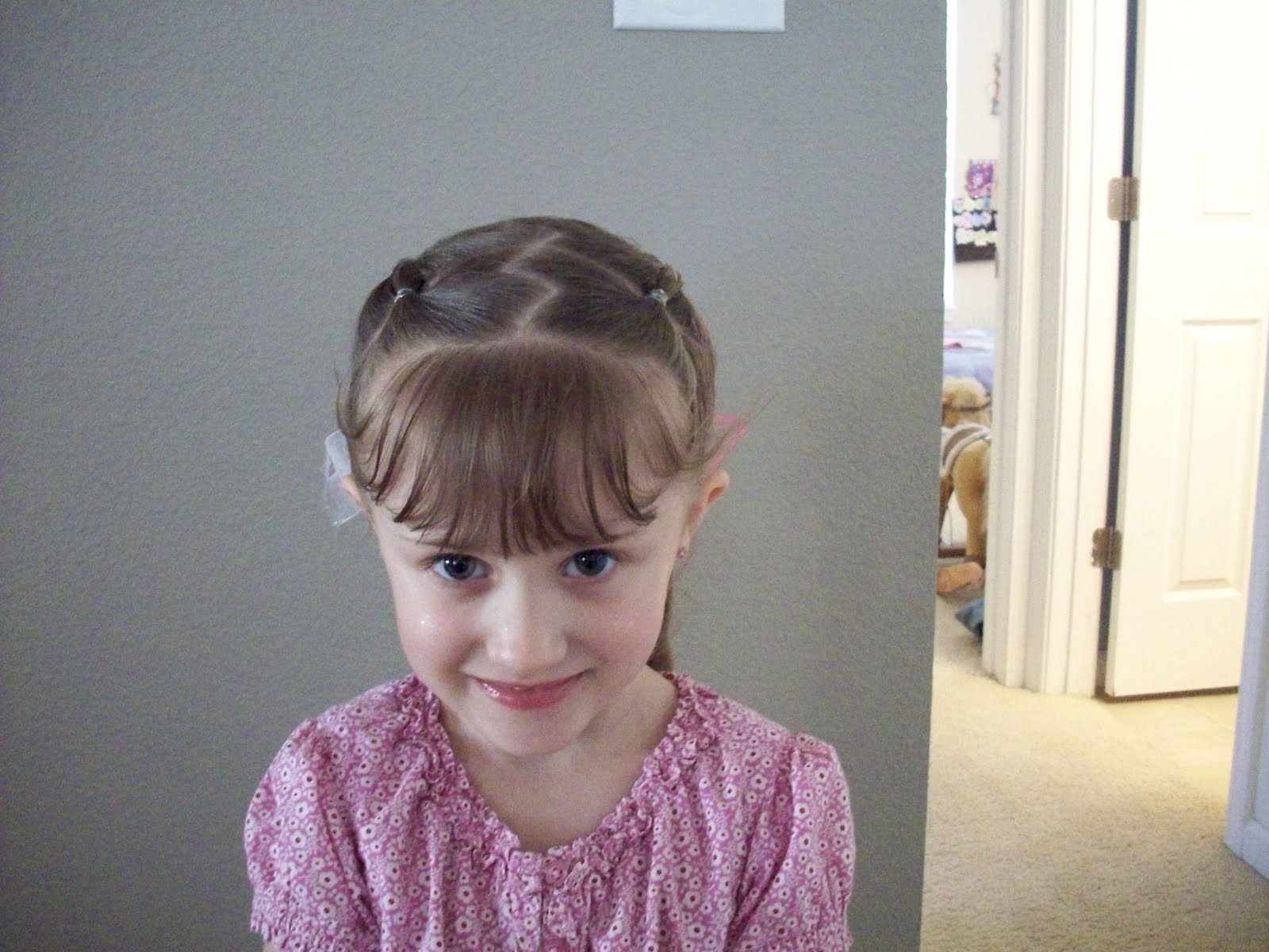 My Little one's hair Zig Zag rubber band pigtails