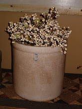 Old three gallon crock with tallow berries