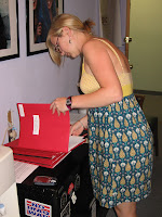 EPIC volunteer Natasha Mooney helps organize constituent letters.