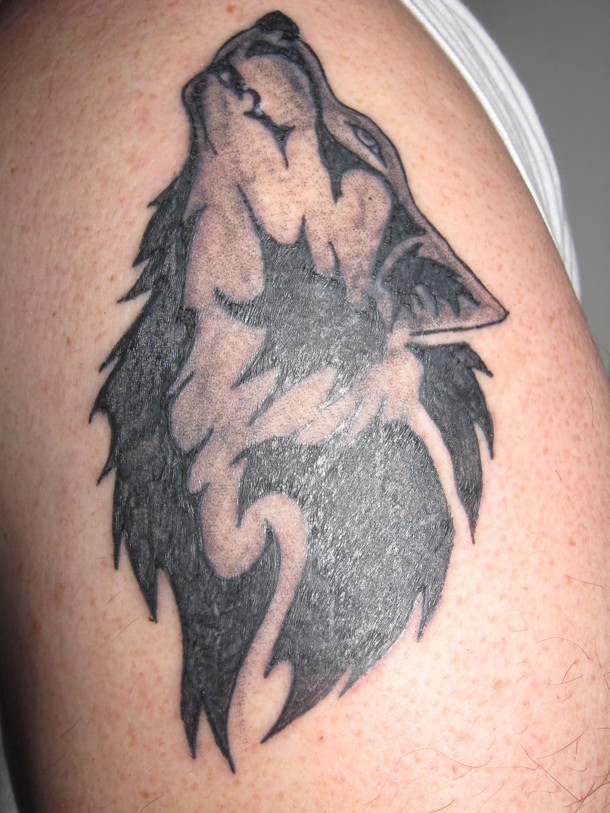 wolves tattoos. wolf tattoo on arm