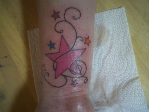 Flower Tattoo With Stars. stars and vines tattoos