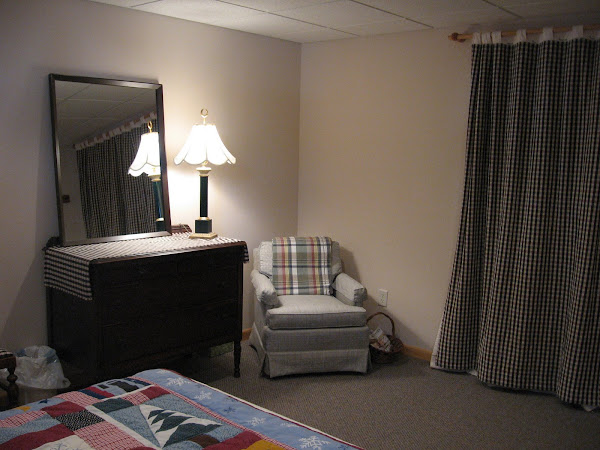 Lower level bedroom with queen bed