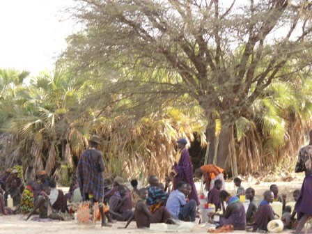 Relaxing, selling and drinking at the third village
