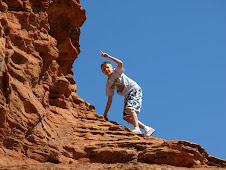 Gunner W. climbing the red rocks in St. George