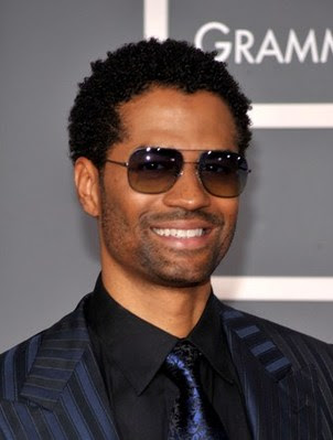  cool short curly black haircut.This is singer Eric Benet arrives at the 