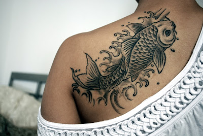 Women tattooed fish species