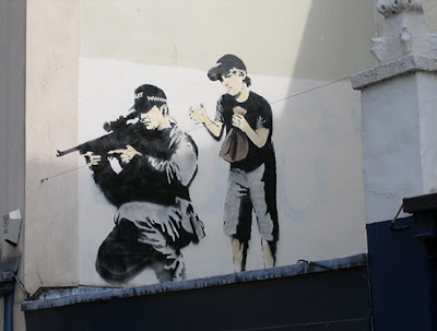 uk graffiti artist banksy. Graffiti artist named Banksy.
