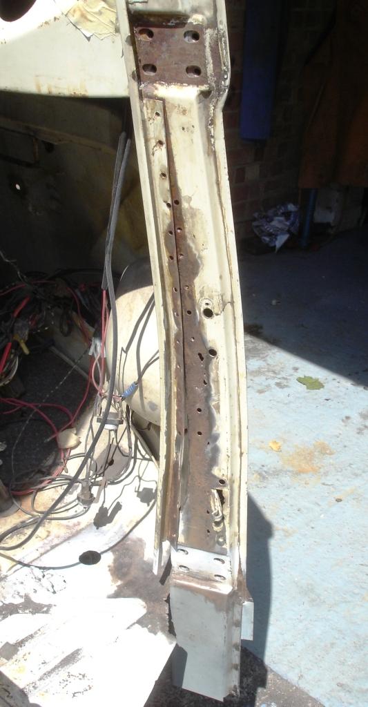 [A+piller+rust+holes.JPG]