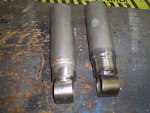 Front shock extenders