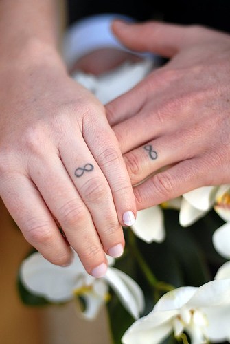 infinity sign tattoo. infinity wedding rings