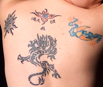 Celtic sun, dragons and moon by Takuma Shinozaki - Bonten Tattoo Studio 