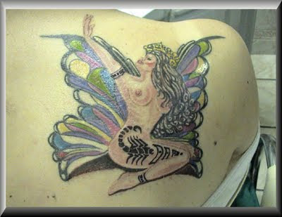 Labels: Butterfly Tattoo Design on Back Girl