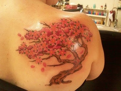 cherry blossom tree tattoo side. cherry tree tattoo side.