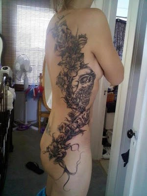 tattoo of roses. rose tattoos on back. black
