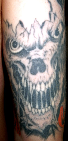 skull head tattoos. skull tattoo on back
