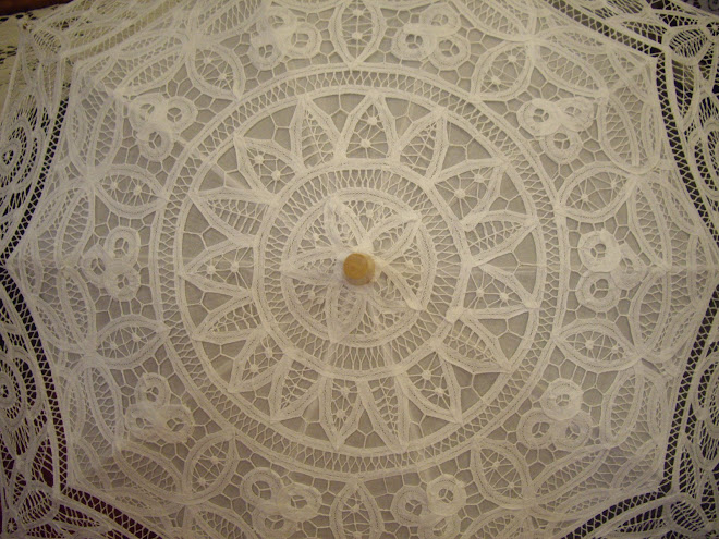 Uluwatu White Lace Umbrella Closeup Photo