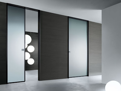 Interior glass doors by Rimadesio