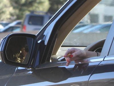 miley cyrus smoking a cigarette 2011. miley cyrus smoking cigarette